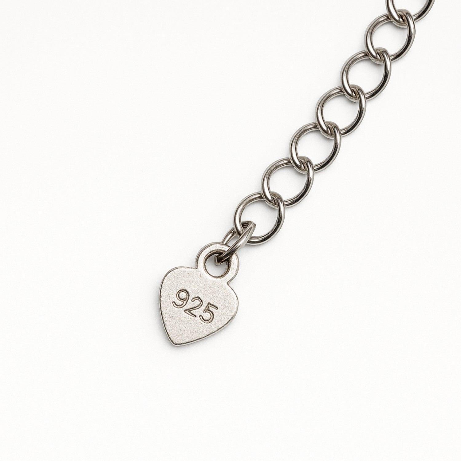 My Giving Store .925 sterling silver chain necklace with heart-shaped tag engraved '925'.