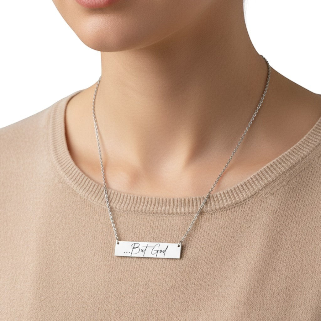 My Giving Store sterling silver bar necklace engraved with "...But God" in script font. Christian faith jewelry.
