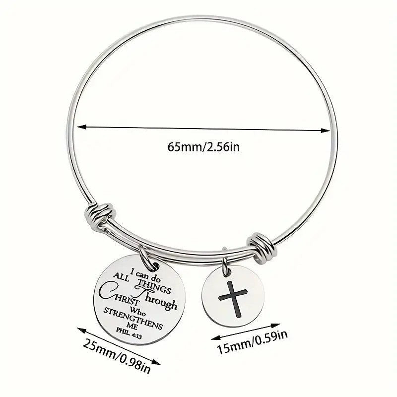 My Giving Store silver-tone adjustable bangle bracelet with cross charm and Philippians 4:13 scripture medallion.
