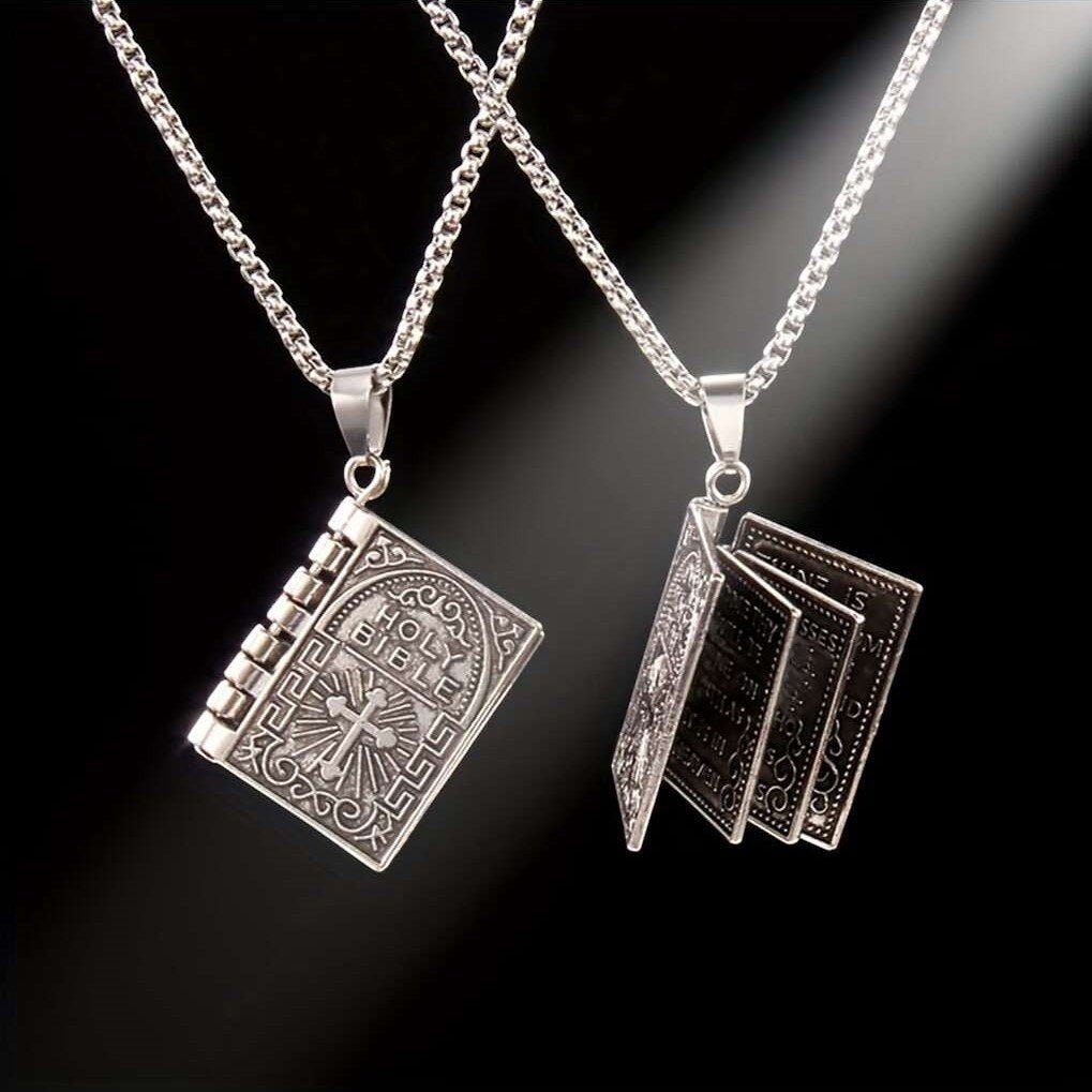 My Giving Store silver pendant necklace shaped like an open bible with The Lord's Prayer engraved.