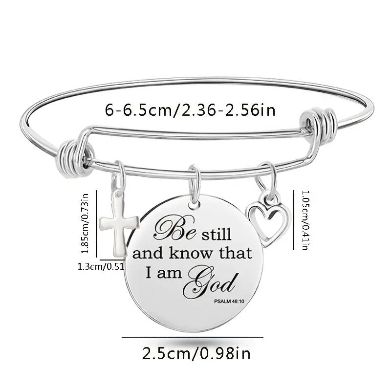 My Giving Store silver-tone adjustable bangle bracelet with cross, heart, and Psalm 46:10 medallion.
