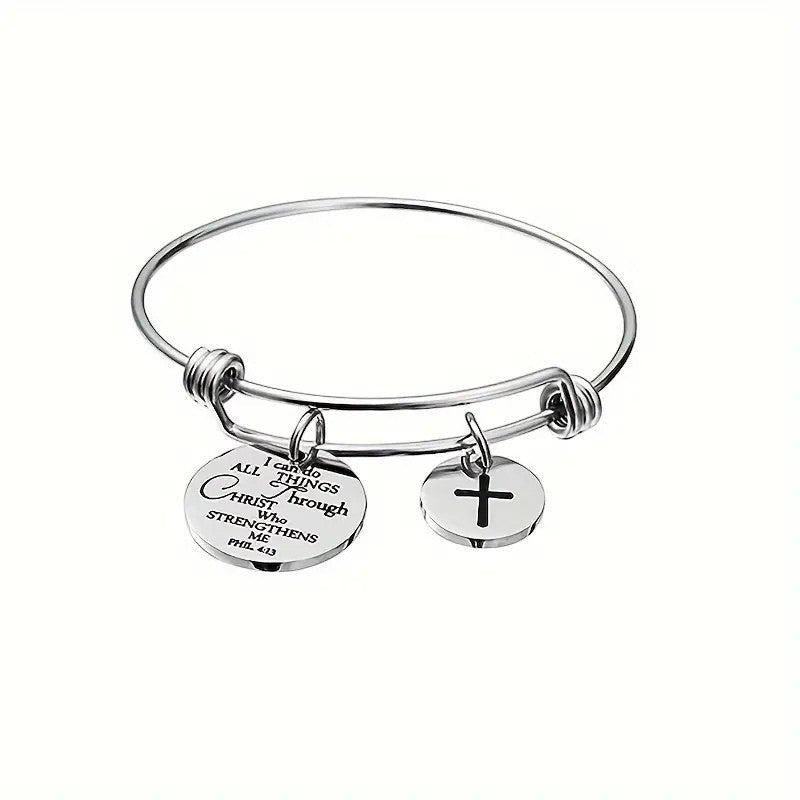 My Giving Store silver-tone adjustable bangle bracelet with cross charm and Philippians 4:13 scripture medallion.