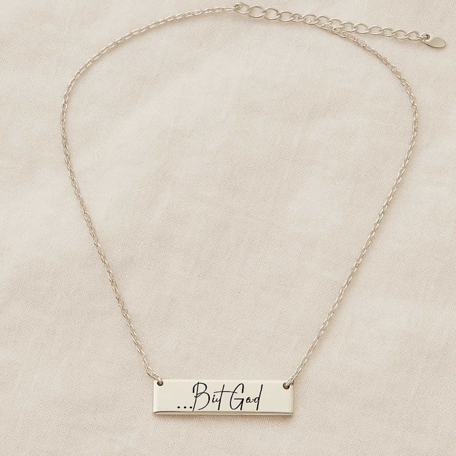 My Giving Store sterling silver bar necklace engraved with "...But God" in script font. Faith jewelry gift.